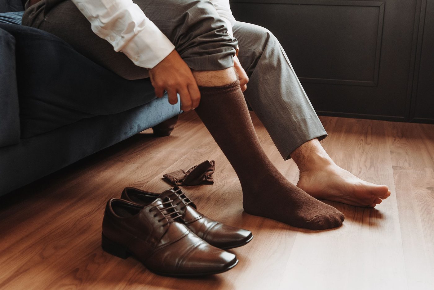 Seam-free dress socks being put on